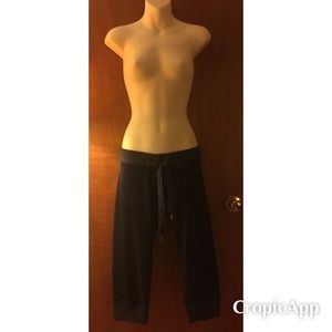 JUICY COUTURE BLACK VELOUR SLIM PANTS.